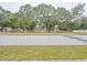 House exterior from across the street, showing landscaping at 1708 Nebraska Ave, Kissimmee, FL 34744