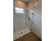 Modern bathroom featuring a glass-enclosed shower and white subway tile at 3962 Kennebunk Loop, Mount Dora, FL 32757