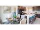 Open kitchen with a large island, stainless appliances, and eat-in dining area at 2755 San Marco Way, Winter Haven, FL 33884