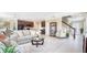 Inviting living room adjacent to modern kitchen, perfect for entertaining at 2755 San Marco Way, Winter Haven, FL 33884
