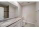 Bathroom boasts double sinks and granite countertop at 1445 General Mac Arthur Ave, Daytona Beach, FL 32114