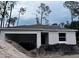 Image of a house still under construction, in a developing neighborhood, with lots ready for building at 1445 General Mac Arthur Ave, Daytona Beach, FL 32114
