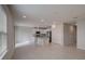 Open kitchen with granite island and stainless steel appliances at 1445 General Mac Arthur Ave, Daytona Beach, FL 32114