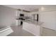 Modern kitchen with stainless steel appliances and granite countertops at 1445 General Mac Arthur Ave, Daytona Beach, FL 32114