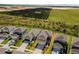 New homes boast lush landscaping and views of verdant fields and mature groves at 7367 Catania Loop, Clermont, FL 34714