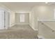 The bonus room is carpeted, painted in a neutral color, and has one window for natural light at 7367 Catania Loop, Clermont, FL 34714