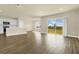 Open concept living area with kitchen and access to backyard at 7367 Catania Loop, Clermont, FL 34714