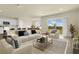 Inviting living room featuring a comfortable seating area and an open layout to the kitchen at 7367 Catania Loop, Clermont, FL 34714