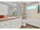 Well-maintained bathroom featuring a shower-tub combo and ample vanity space at 4223 Arlington Ridge Blvd, Leesburg, FL 34748
