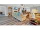 Bright living room with hardwood floors and casual seating at 4223 Arlington Ridge Blvd, Leesburg, FL 34748