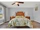 Spacious bedroom with a ceiling fan and abundant natural light at 4223 Arlington Ridge Blvd, Leesburg, FL 34748