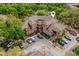Aerial view of community featuring ample parking, attractive landscaping, and inviting entryways at 478 N Pin Oak Pl # 308, Longwood, FL 32779