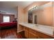 Bathroom featuring a large counter and a view of the bedroom at 478 N Pin Oak Pl # 308, Longwood, FL 32779
