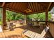 Enjoy outdoor relaxation in this gazebo with comfortable seating and a scenic view at 478 N Pin Oak Pl # 308, Longwood, FL 32779