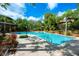 Sparkling pool surrounded by lush landscaping for a tranquil oasis at 478 N Pin Oak Pl # 308, Longwood, FL 32779