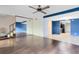 Spacious living area with wood floors and a view of the kitchen at 818 Park Lake Cir # 10, Maitland, FL 32751