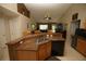 An open kitchen island with a breakfast bar at 1201 Thornbury Ct, Winter Garden, FL 34787