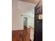 Inviting living room showcasing beautiful hardwood floors and modern lighting fixture at 5132 Conroy Rd # 937, Orlando, FL 32811