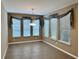 Formal dining room featuring tile floors and ample natural light at 251 Silver Maple Rd, Groveland, FL 34736