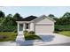 Charming single-story home featuring a two-car garage and beautifully landscaped front yard at 2767 San Marco Way, Winter Haven, FL 33884