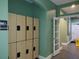 Locker room featuring several lockers and access to restrooms, providing convenience and organization for members at 8543 Sunrise Key, Kissimmee, FL 34747