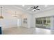 Spacious living area with sliding glass doors leading to the backyard at 3018 Avalon Ridge Ln, Winter Garden, FL 34787