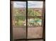 Balcony with a view of the community pool, palm trees and other buildings at 5500 Metrowest Blvd # 304, Orlando, FL 32811