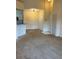 Open living room with carpeted floors and lots of natural light at 5500 Metrowest Blvd # 304, Orlando, FL 32811