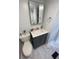 Clean bathroom with gray vanity and marble-look floor tiles at 9000 Us Highway 192 # Lot 316, Clermont, FL 34714