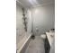 Clean bathroom with marble-look walls and updated fixtures at 9000 Us Highway 192 # Lot 316, Clermont, FL 34714