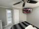 Main bedroom with mounted TV and closet at 9000 Us Highway 192 # Lot 316, Clermont, FL 34714