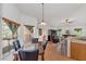 Cozy breakfast nook with a marble-top table and four chairs at 20406 Racine St, Orlando, FL 32833