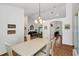 Bright dining area with a view into the living room at 20406 Racine St, Orlando, FL 32833