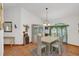 Elegant dining room with a white table and chairs at 20406 Racine St, Orlando, FL 32833