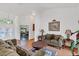 Open living space with tiled floors and a view to the entryway at 20406 Racine St, Orlando, FL 32833