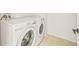 Convenient laundry room with LG washer and dryer at 6360 Chorus Dr, Mascotte, FL 34753