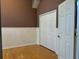 An empty room with hardwood floors, fresh paint, and a closet at 706 Santee Terre Ln, Winter Garden, FL 34787