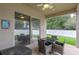 Covered patio with outdoor furniture, ceiling fan, and a view of the fenced backyard at 706 Santee Terre Ln, Winter Garden, FL 34787