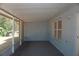 This home includes a screened in patio with lots of space and a calming view at 1124 Chateau Cir, Minneola, FL 34715