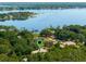 Aerial view of lakefront property with location pin marking the house at 1126 Kelso Blvd, Windermere, FL 34786