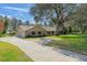 Ranch home with a large yard and mature trees at 1126 Kelso Blvd, Windermere, FL 34786