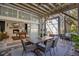 Covered outdoor patio with fireplace in living room, dining area, blending indoor and outdoor living at 809 E Ridgewood St, Orlando, FL 32803
