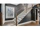 Modern staircase with metal railing and dark walls at 809 E Ridgewood St, Orlando, FL 32803