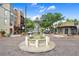 Picturesque street view featuring a central fountain and surrounding buildings, showcasing community charm at 809 E Ridgewood St, Orlando, FL 32803