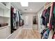 Large walk-in closet featuring custom shelving and plenty of space for all your storage needs at 809 E Ridgewood St, Orlando, FL 32803