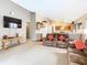Open floor plan living room and kitchen provides an inclusive flow and room for gathering at 215 Riggs Cir, Davenport, FL 33897