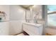 Modern bathroom with double vanity and subway tile at 6031 Ardele Ct, Apopka, FL 32703