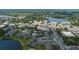 Aerial view of a community near a lake, showing its proximity to businesses, trees and roads at 158 Maitland Ave, Altamonte Springs, FL 32701