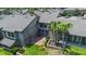 Aerial view of the property showcases its private patio and verdant landscaping at 158 Maitland Ave, Altamonte Springs, FL 32701