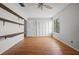 Bedroom featuring laminate floors, ceiling fan, window and a closet at 158 Maitland Ave, Altamonte Springs, FL 32701